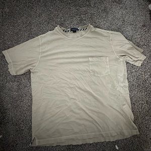 A tan large lightly used T-shirt